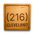 Wooden coaster made of beech featuring a personalized laser engraved design.