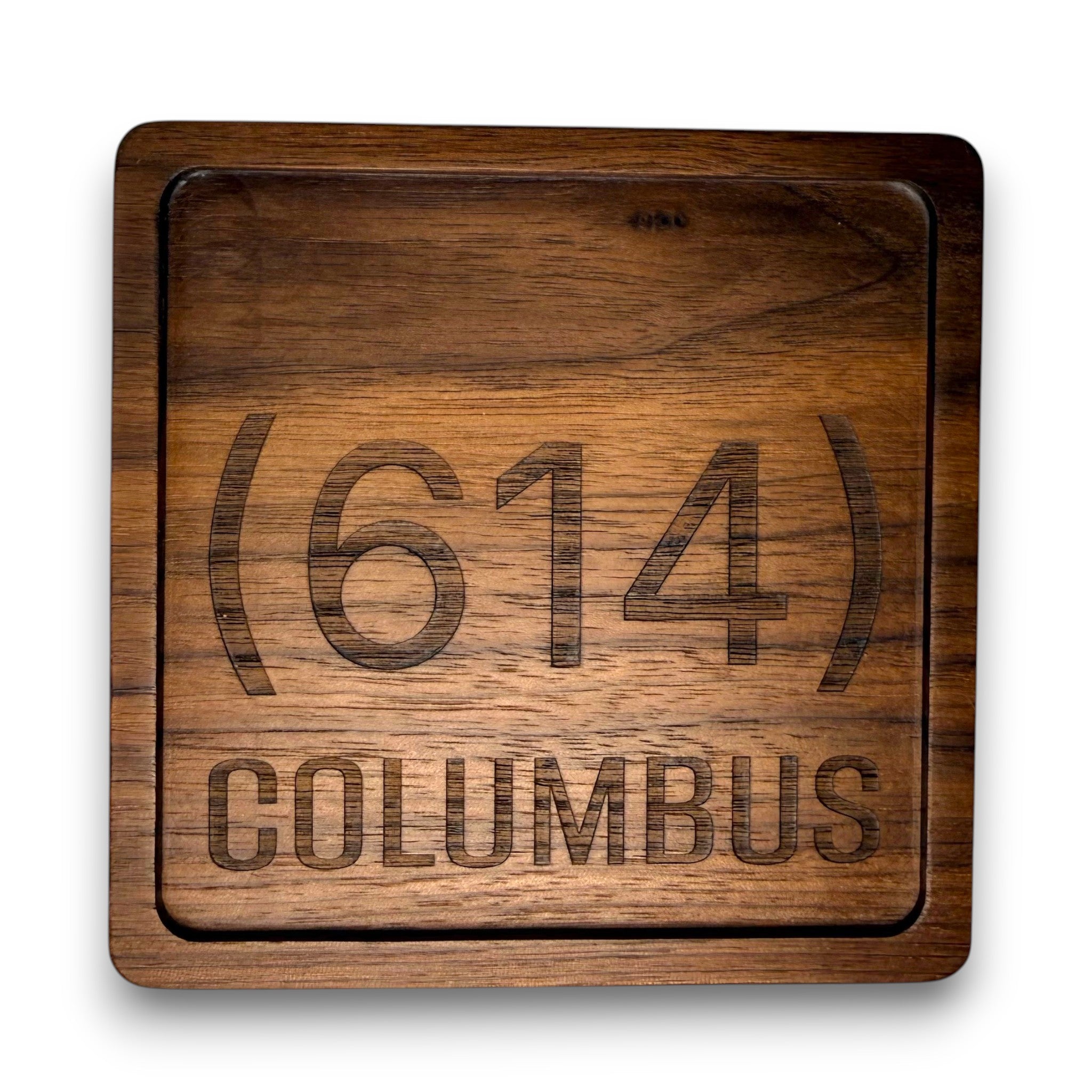 Wooden coaster made of black walnut featuring a personalized laser engraved design.