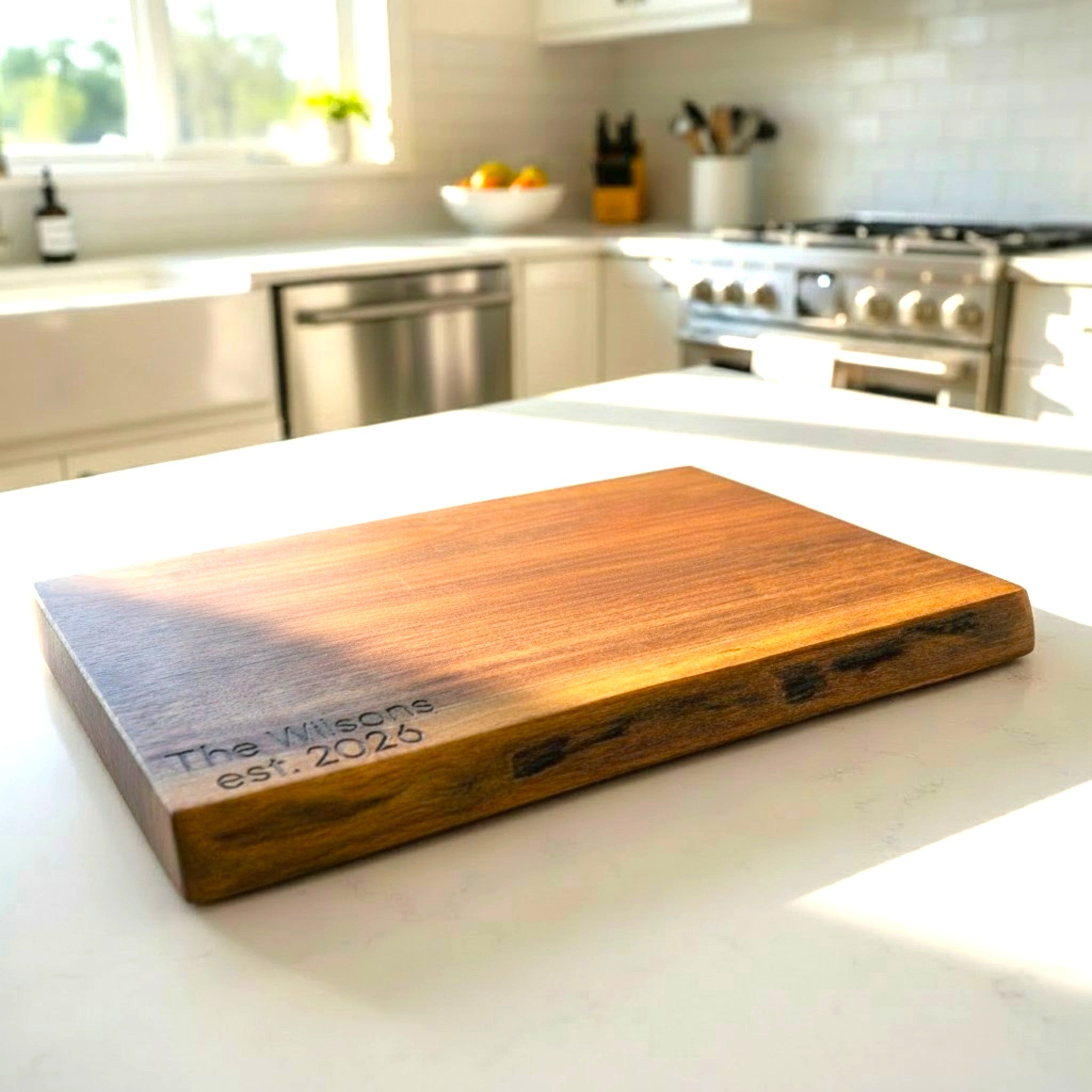 Live edge black walnut wooden cutting board with personalized laser engraved text