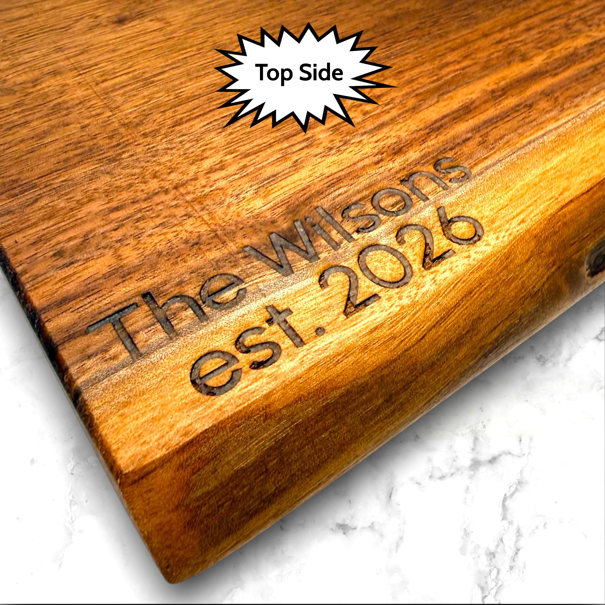 Live edge black walnut wooden cutting board with personalized laser engraved text