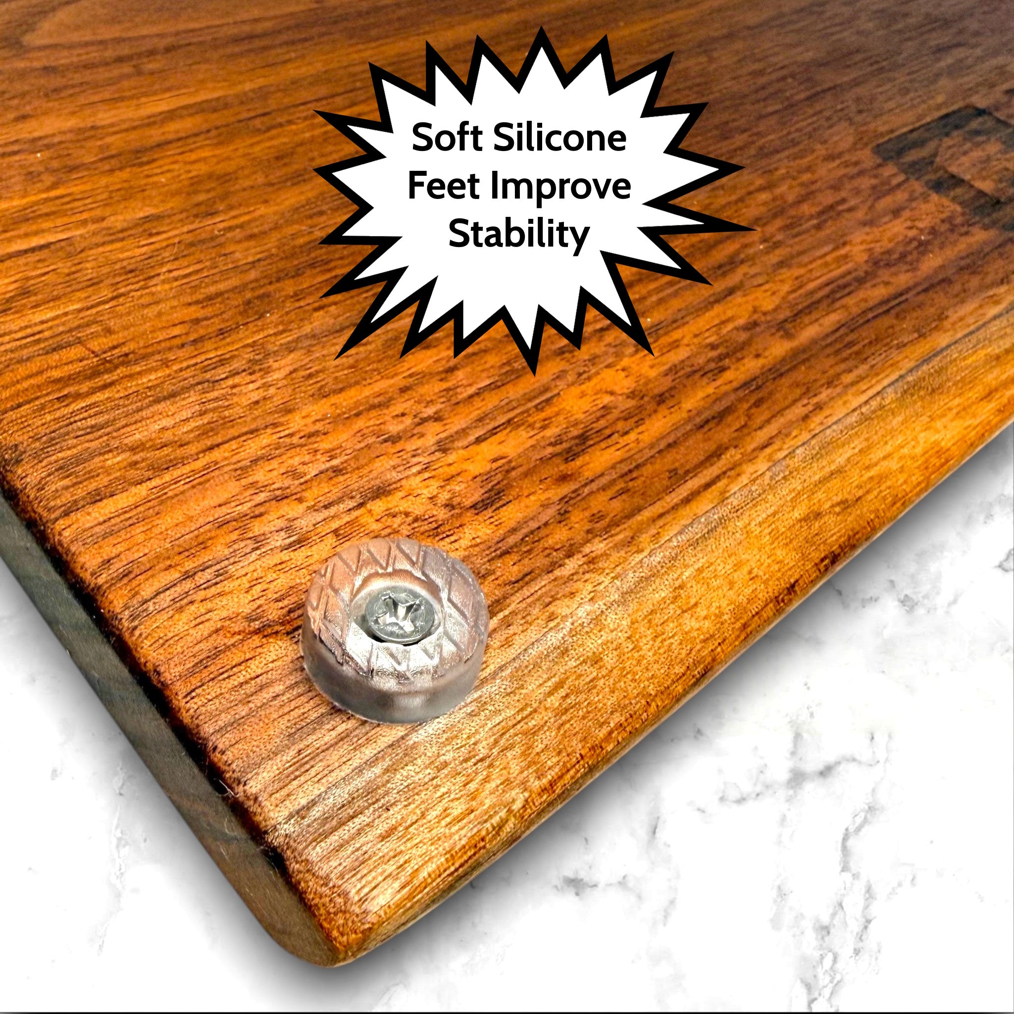 Wooden live edge black walnut cutting board with soft silicone feet.
