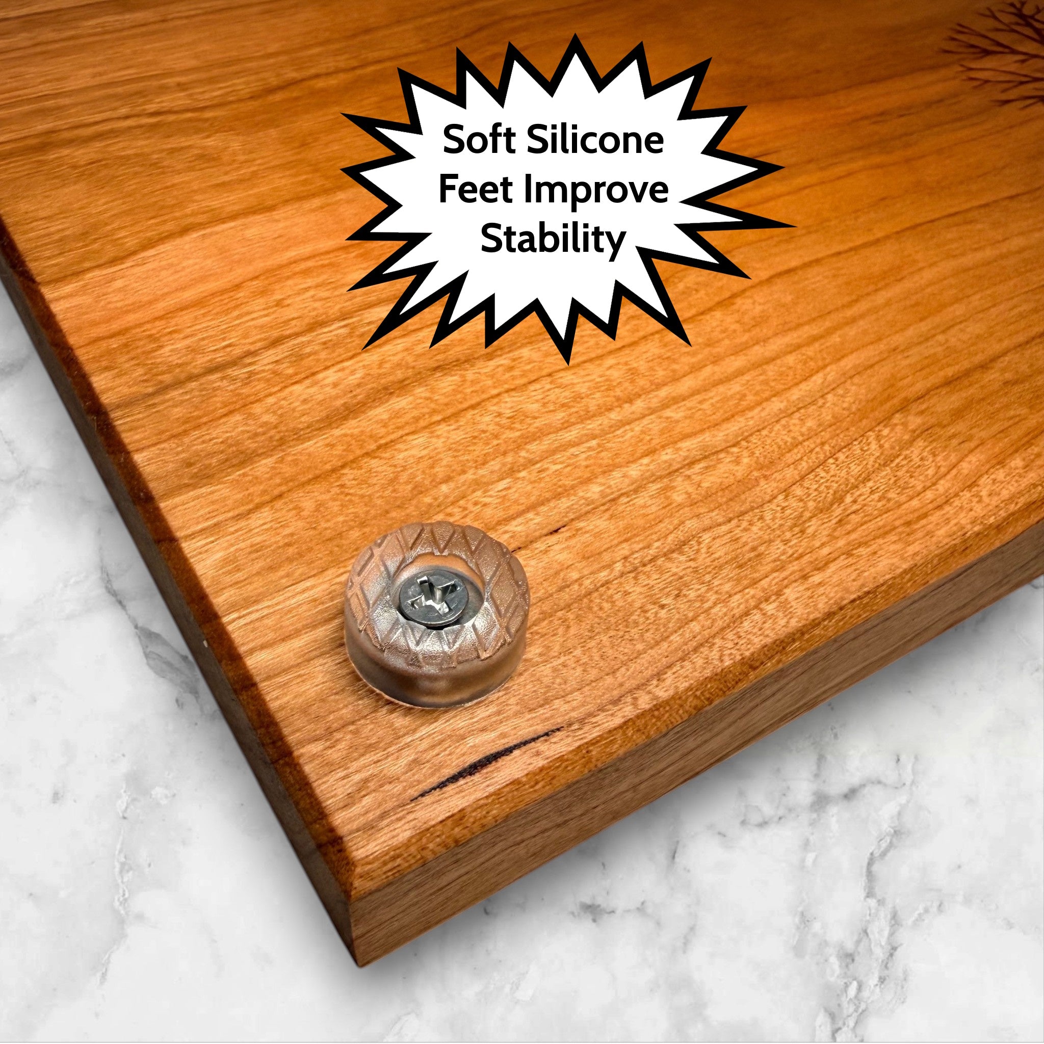 Wooden cherry cutting board with soft silicone feet.