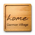 Wooden coaster made of beech featuring a personalized laser engraved design.