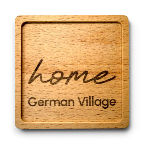 Wooden coaster made of beech featuring a personalized laser engraved design.