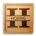 Wooden coaster made of beech featuring a personalized laser engraved design.