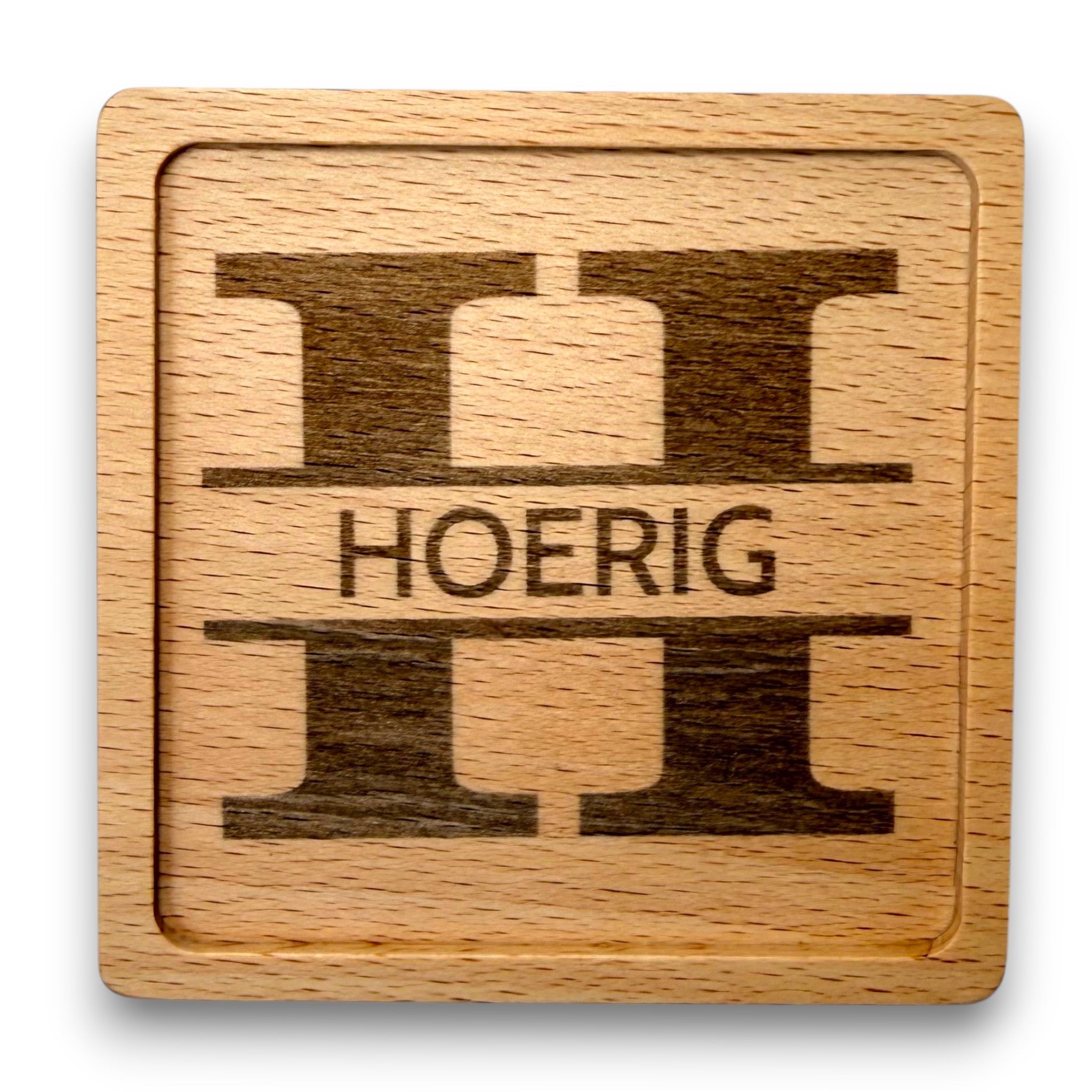 Wooden coaster made of beech featuring a personalized laser engraved design.
