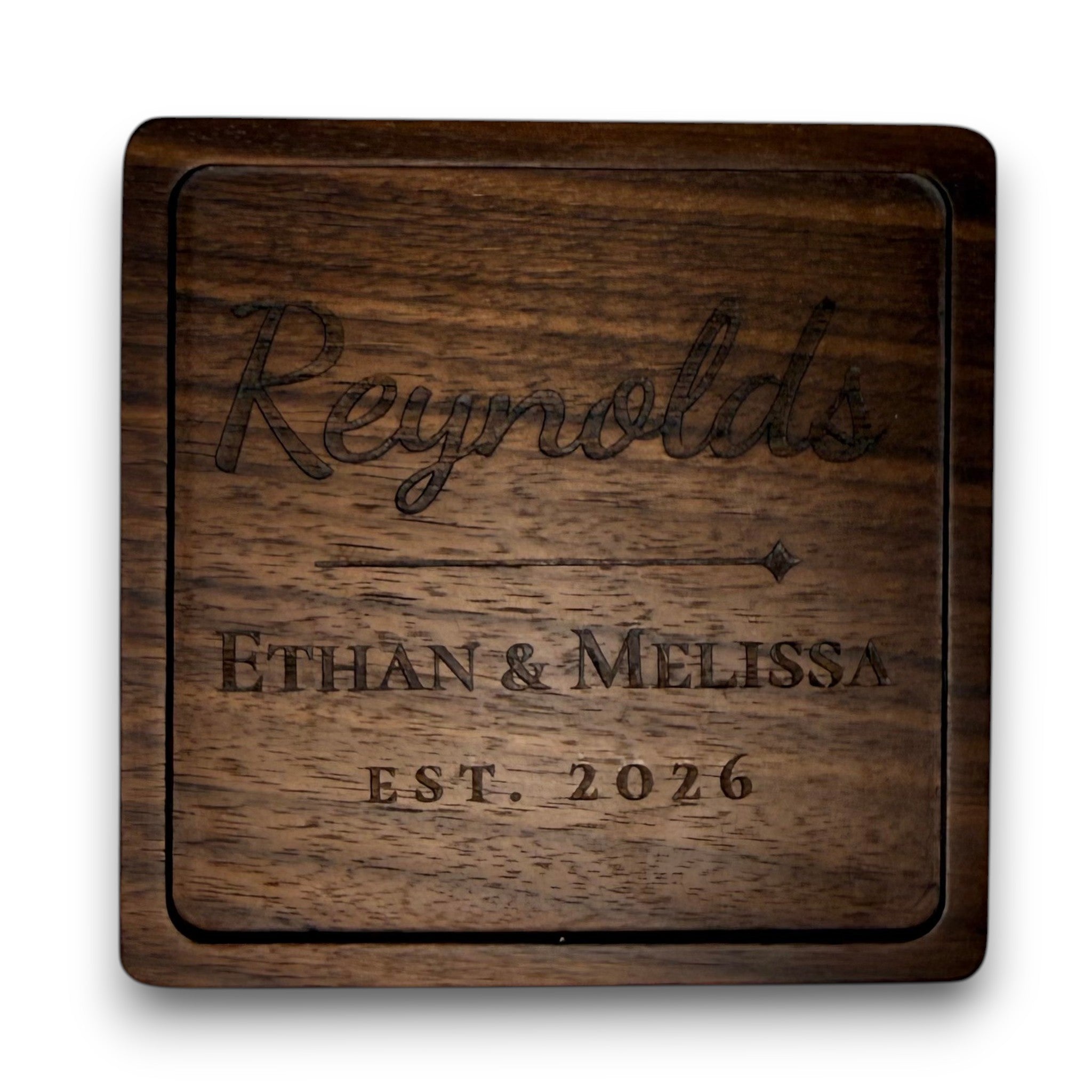 Wooden coaster made of black walnut featuring a personalized laser engraved design.