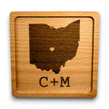 Wooden coaster made of beech featuring a personalized laser engraved design.