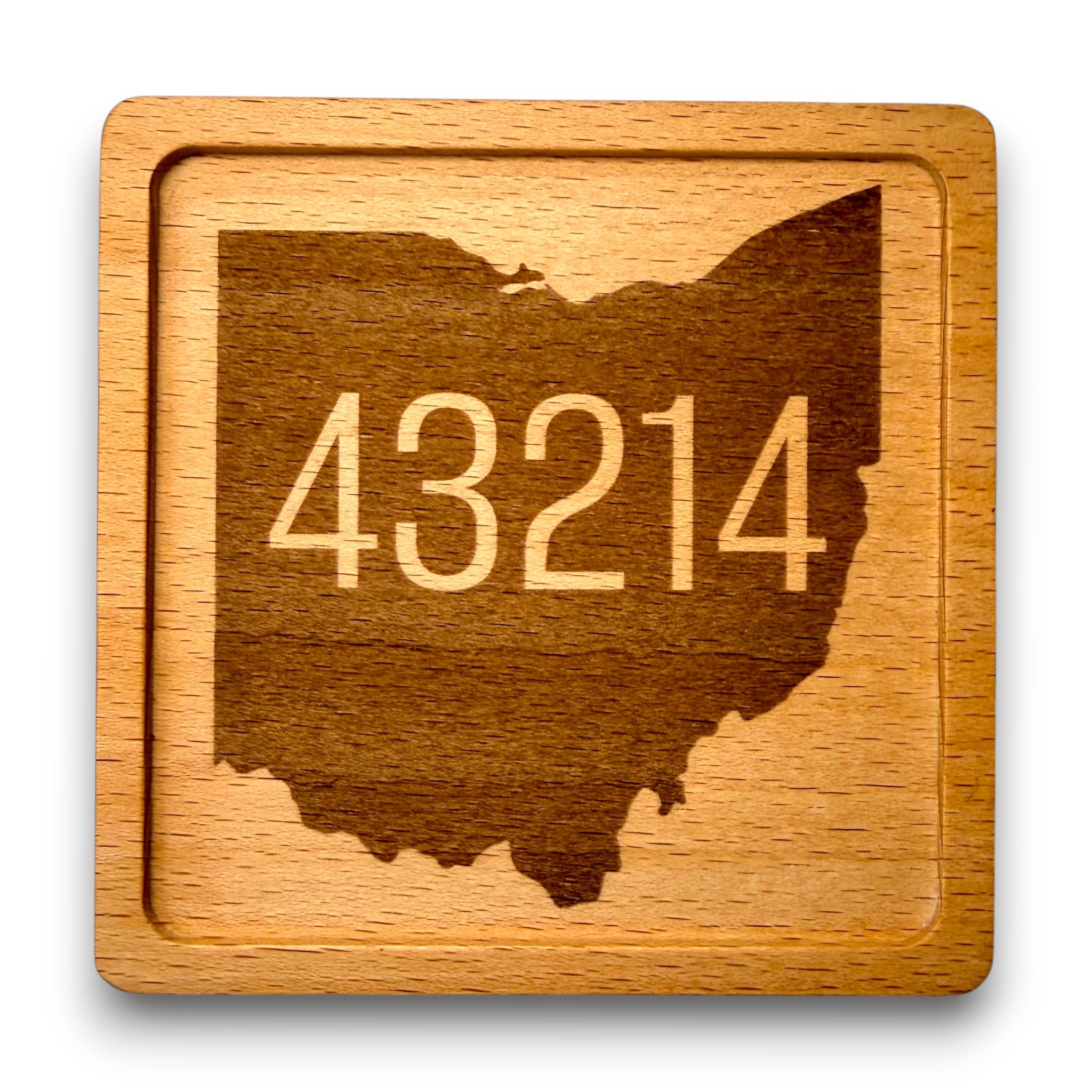 Wooden coaster made of beech featuring a personalized laser engraved design.