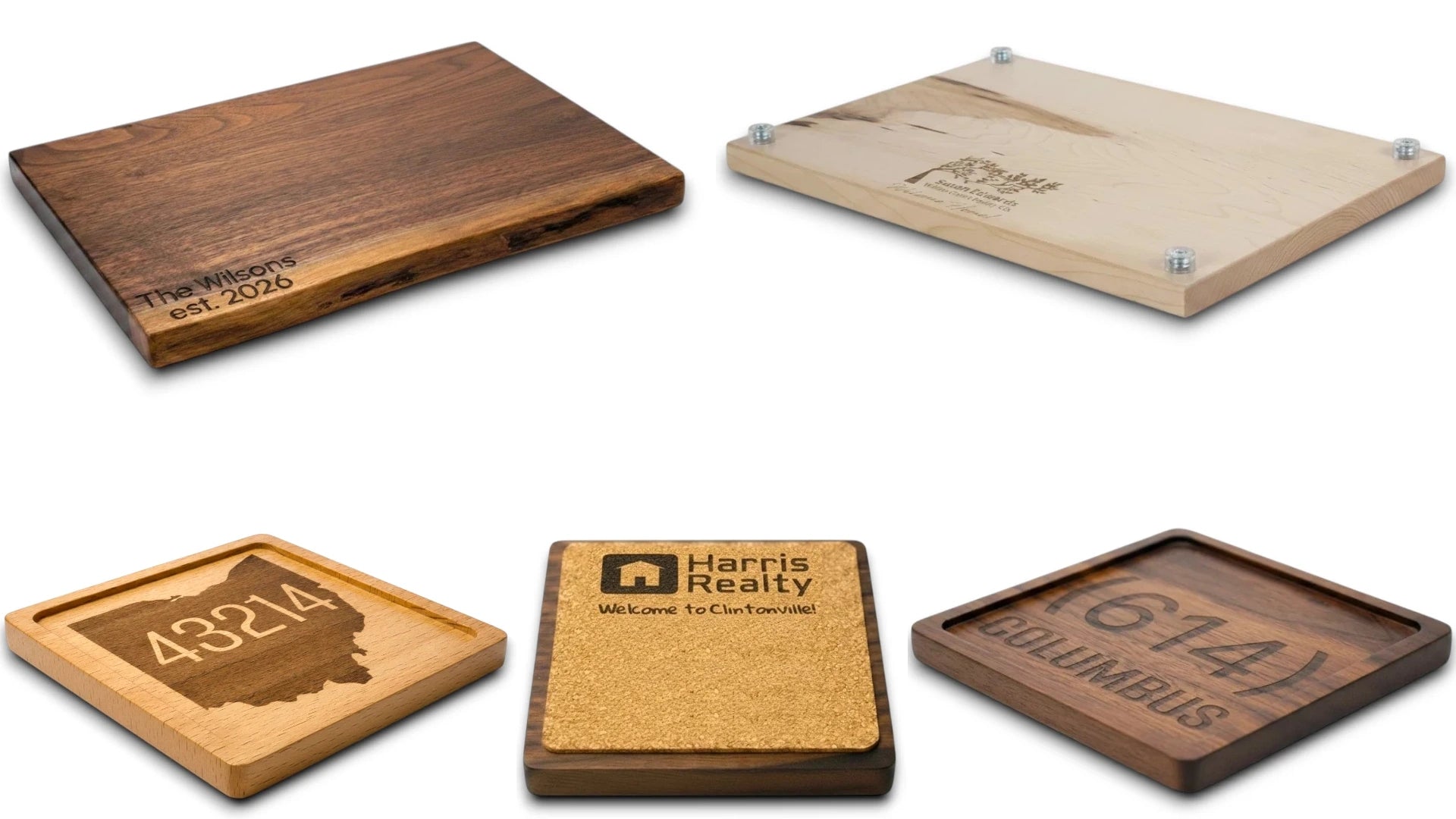 Two cutting boards made of maple and black walnut with a set of beech and black walnut wooden coasters with personalized engraved text and logos on a white background